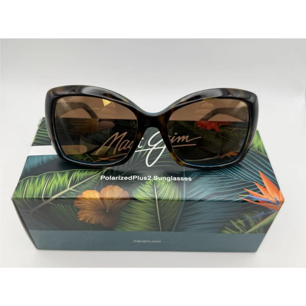 Orchid H735-10P - Tortoise with Peacock - Hcl Bronze Lens by Maui Jim