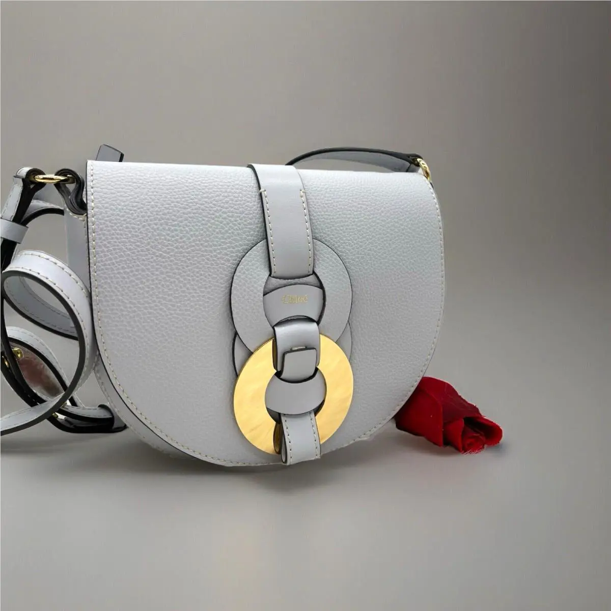 Chloe Women’s Darryl Light Cloud Pebbled Leather Saddle Crossbody Bag