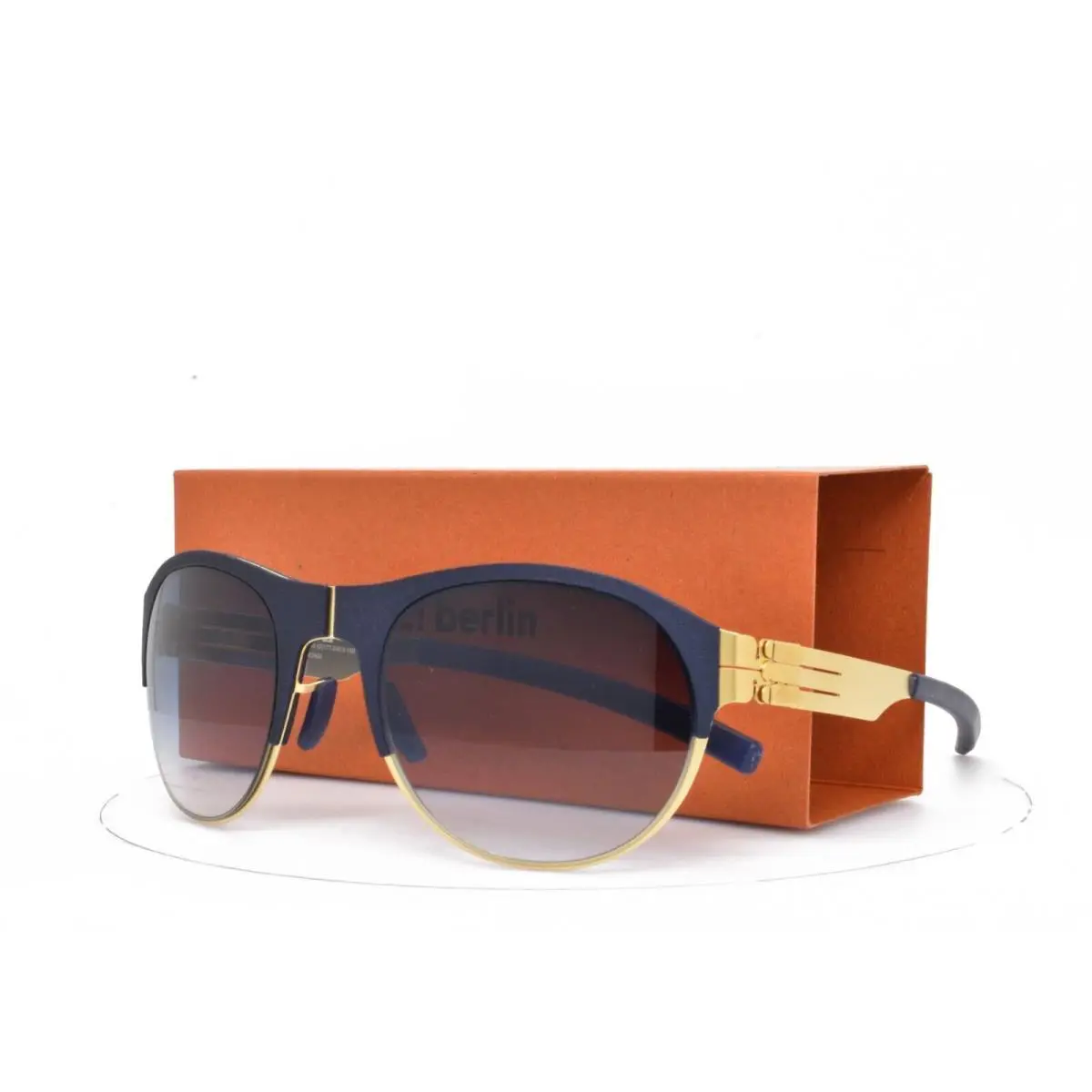 iC Berlin Sunglasses 67 Nixenstrabe Navy Blue Gold Frame Blue Lens 52-24-145 by ic! berlin