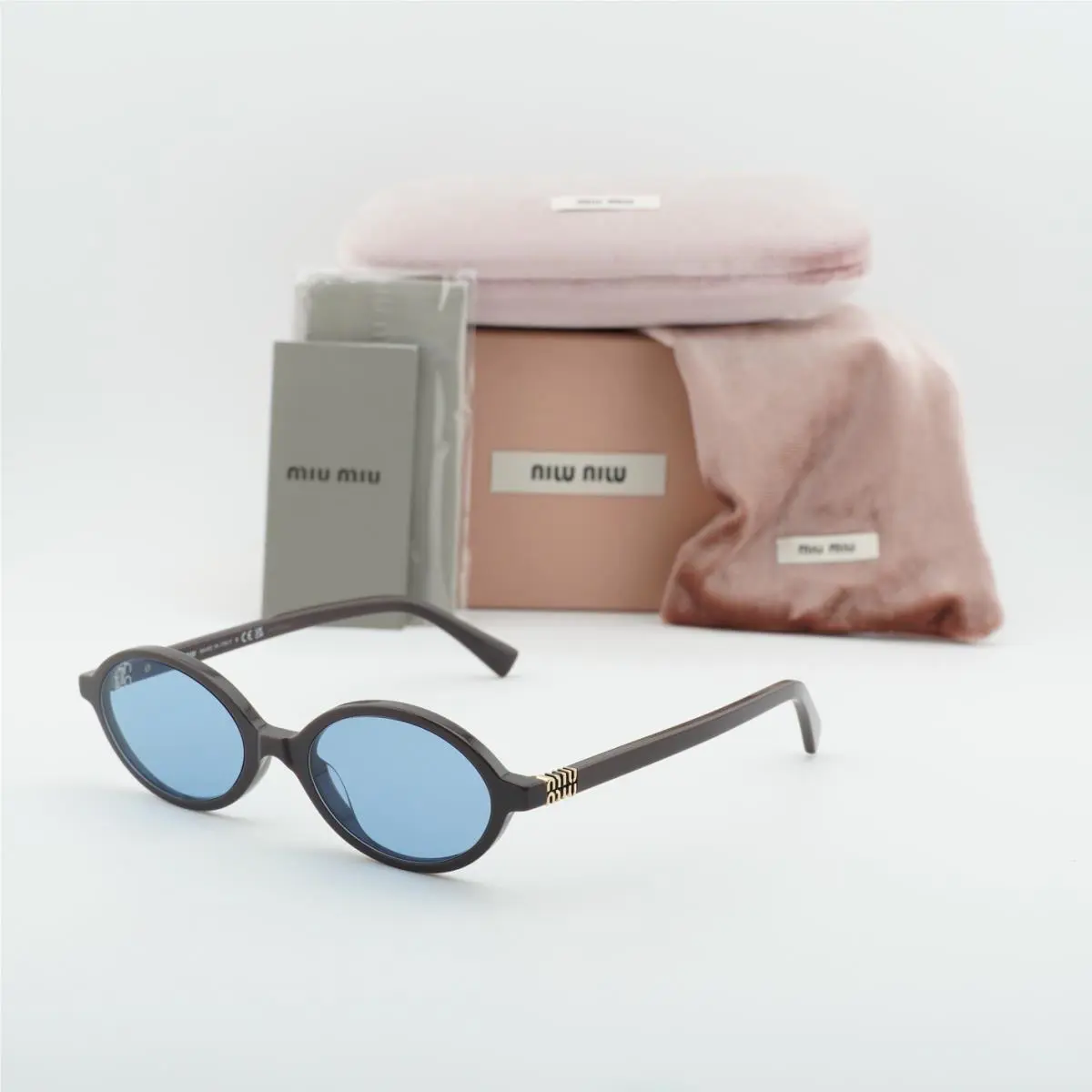Miu Miu MU04ZS 22C60O Moka/light Blue 50-18-140 Sunglasses