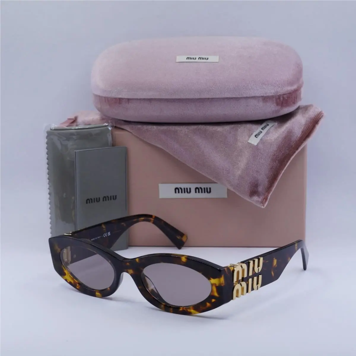 Miu Miu MU11WS 14L20I Honey Havana/light Purple Brown 54-21-135 Sunglasses