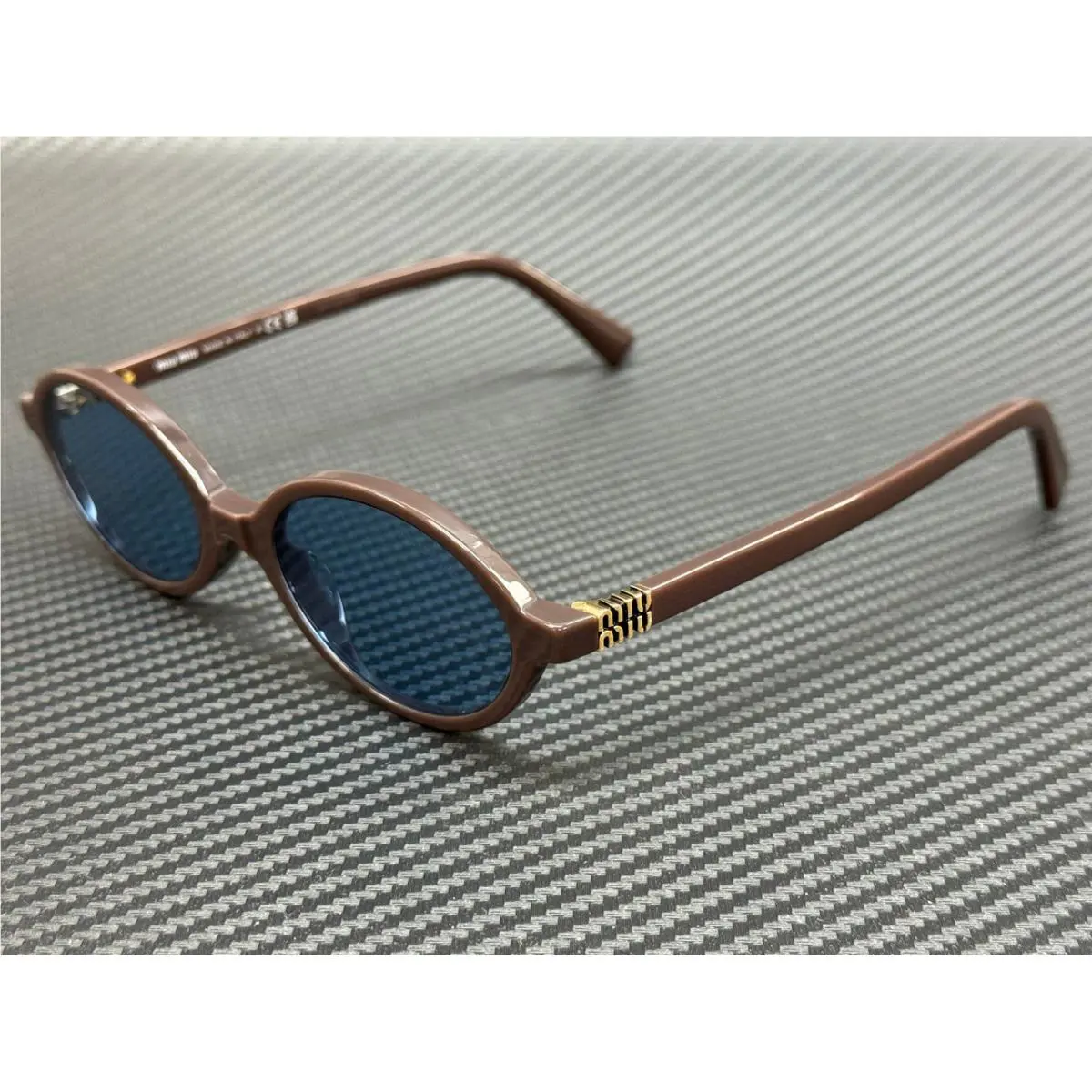 Miu Miu MU 04ZS 22C60O Moka Blue Women`s 50 mm Sunglasses
