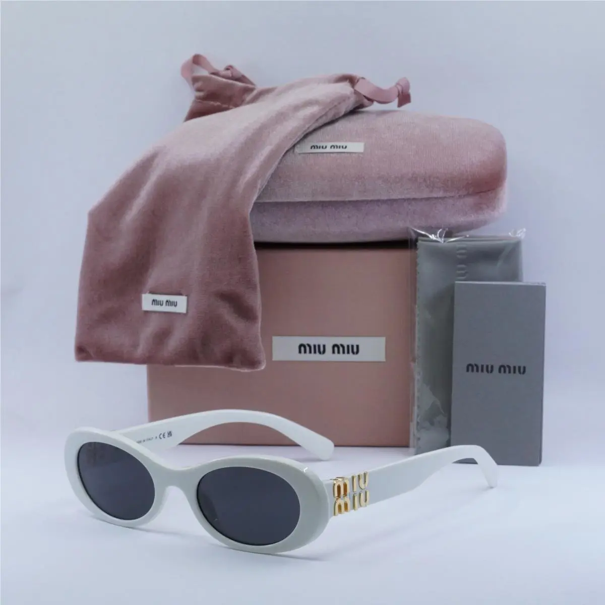 Miu Miu MU06ZS 1425S0 White Ivory/dark Grey 50-20-140 Sunglasses
