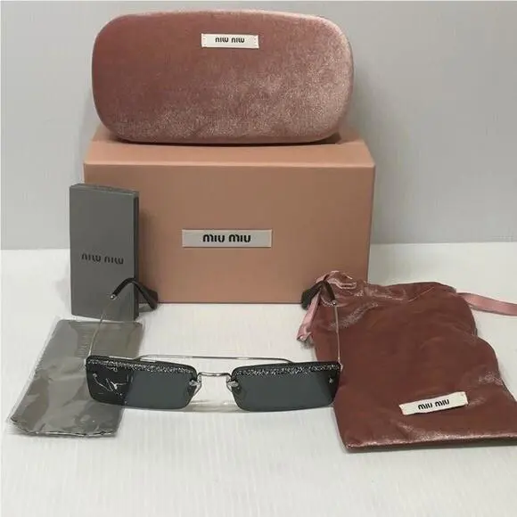 Miu Miu Woman’s Sunglasses Smu 59T Silver Frame Grey Lenses