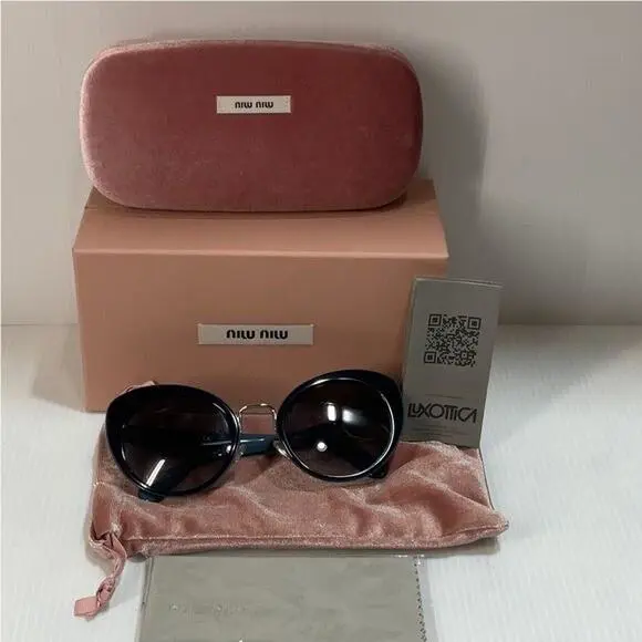 Miu Miu Woman’s Sunglasses Smu 06TTMY-5D1 Cat Eye Made in Italy