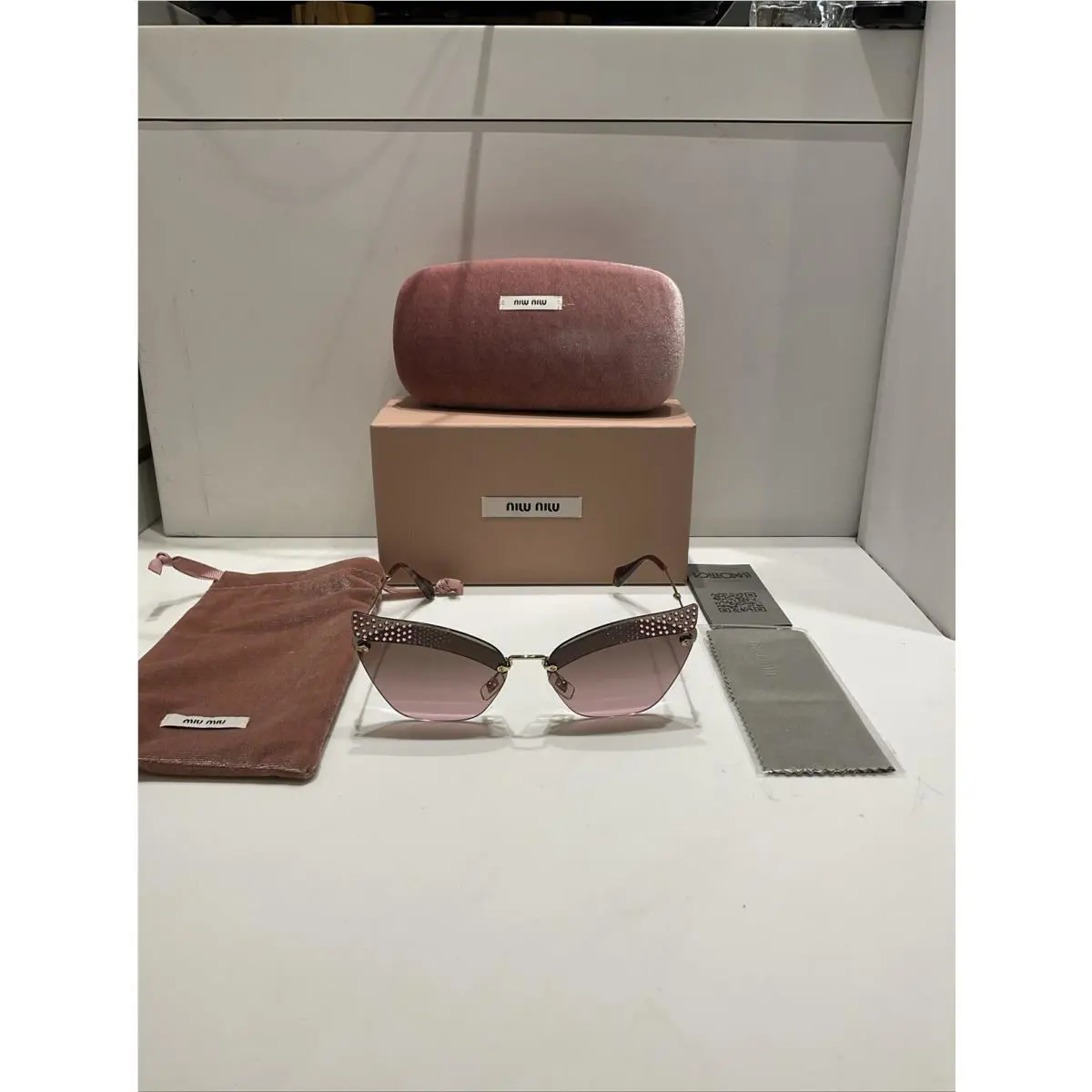 Miu Miu Woman Sunglasses Cat Eye Smu 56T Pink Lenses