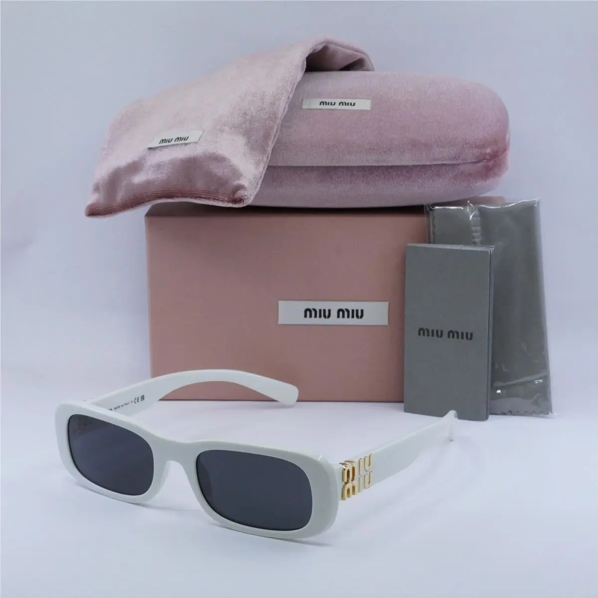 Miu Miu MU08ZS 1425S0 White Ivory/dark Grey 53-20-140 Sunglasses