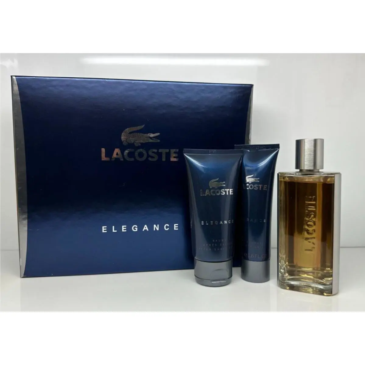 Elegance Gift Set 3.0 Edt Spray + 1.6 Shower Gel + 2.5 After Shave Balm by Lacoste