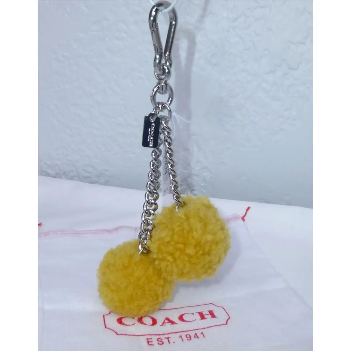 Shearling Pom Pom Bag Charm Key Chains 64172 + Dust Bag Banana (Yellow) by Coach