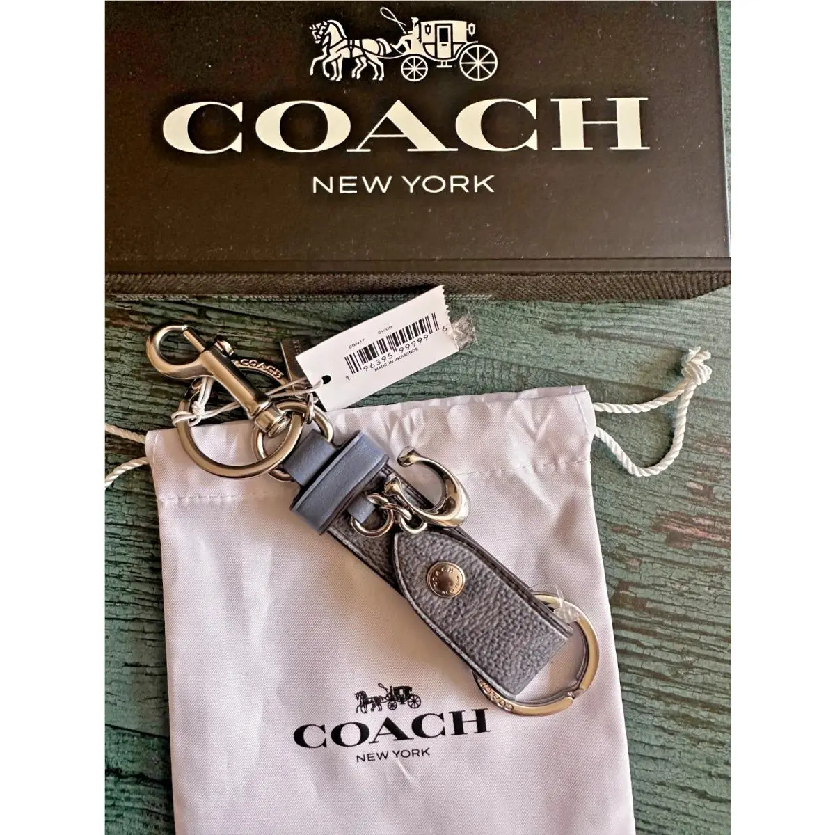 Trigger Snap Bag Charm Refined Calf Leather Key Cha signature canvas/Silver/Chambray by Coach