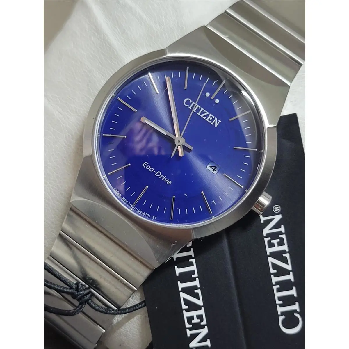 Citizen Womens Eco-drive Axiom Silver / Blue Dial Date Watch EW2670-53L