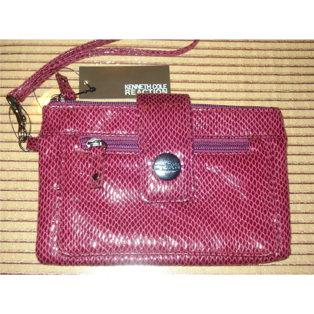 Cool and Cute Kenneth Cole Plum Snakeskin Embossed Leather Like Wristlet