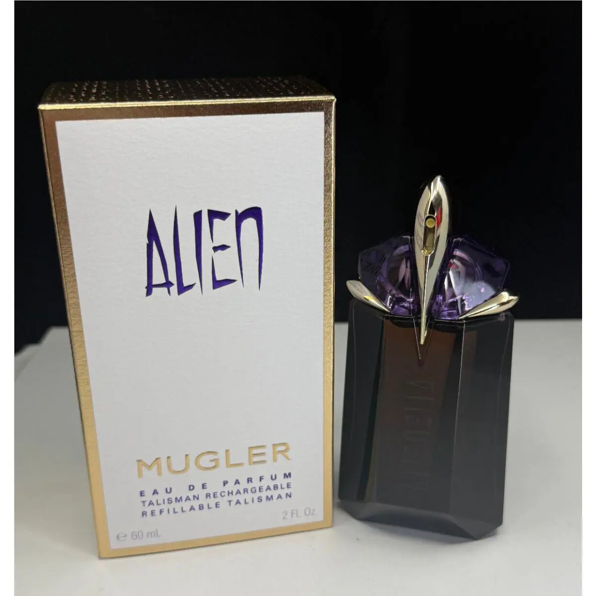 Alien  Eau De Parfum Refillable Talisman 2fl. oz by Mugler