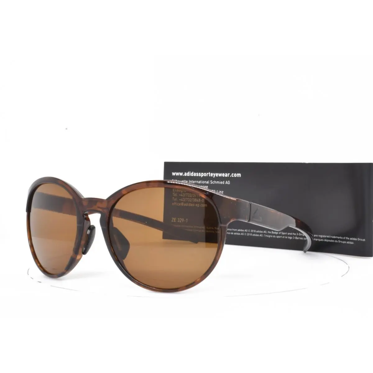 Sunglasses by Silhouette Clear Brown Marble Lst Lens Austria 31 6000 by Adidas