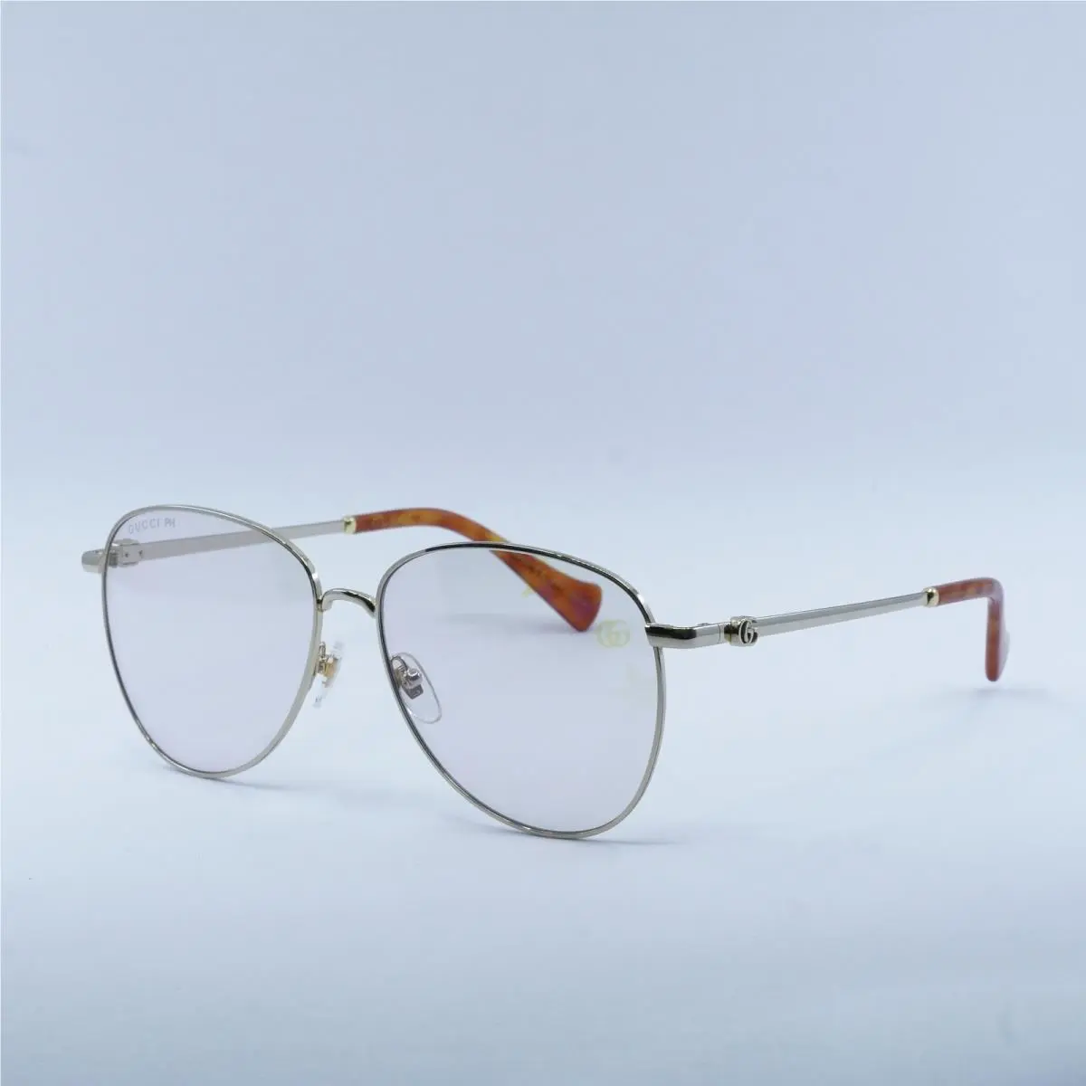 GG1419S 004 Gold/clear to Violet with Star Pattern Photochromic by Gucci