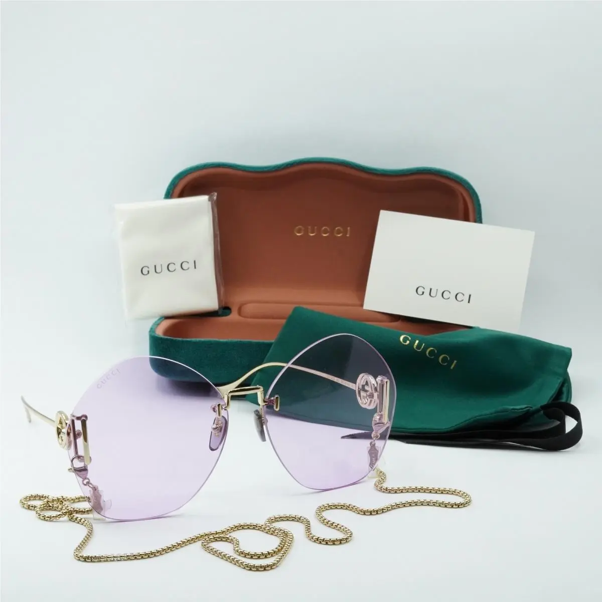 Gucci GG1203S 001 Gold/violet with Gold Chain 65-16-140 Sunglasses