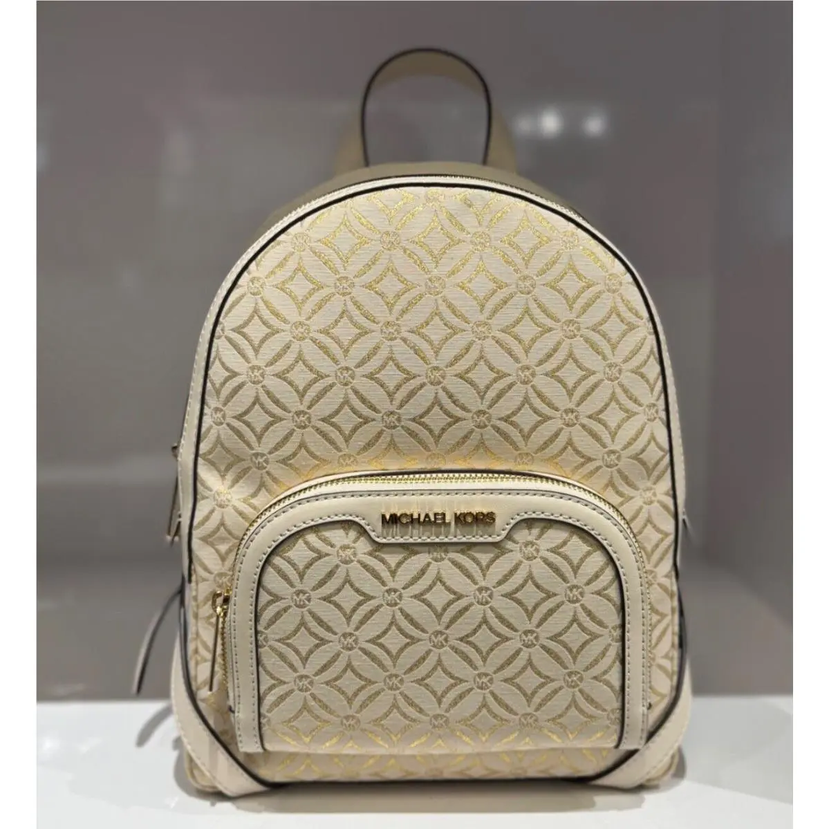 Jaycee Medium Zip Pocket Backpack GRAPHIC LOGO GLITTER GOLD MK LIGHT CREAM by Michael Kors