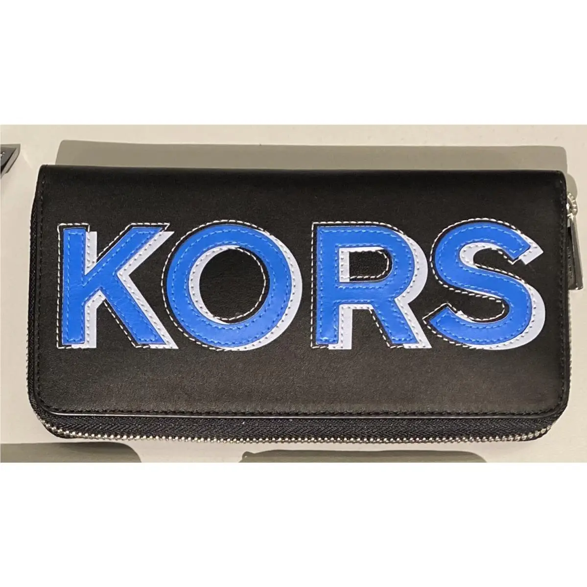 Cooper Tech Zip Around Leather Continental Wallet Purse Black Leather/Pop blue by Michael Kors