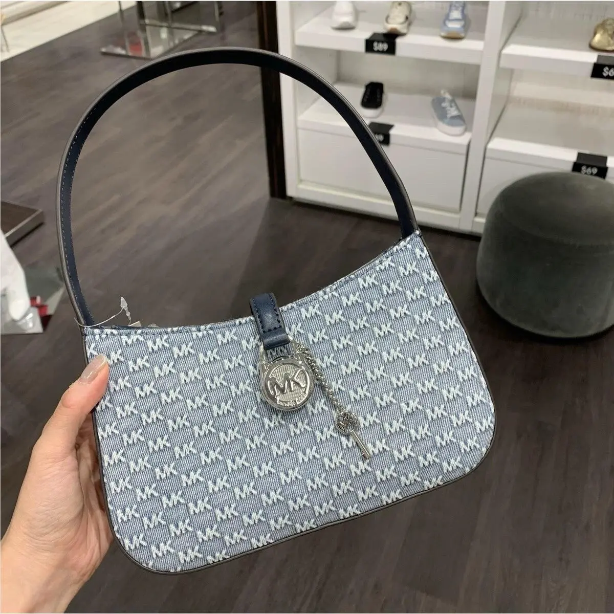 Michael Kors Lyra Small Logo Embossed Washed Denim Pochette IN LT Denim