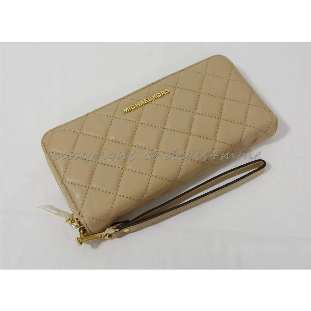 Quilted Leather Continental Zip Around Wallet/wristlet in Bisque by Michael Kors