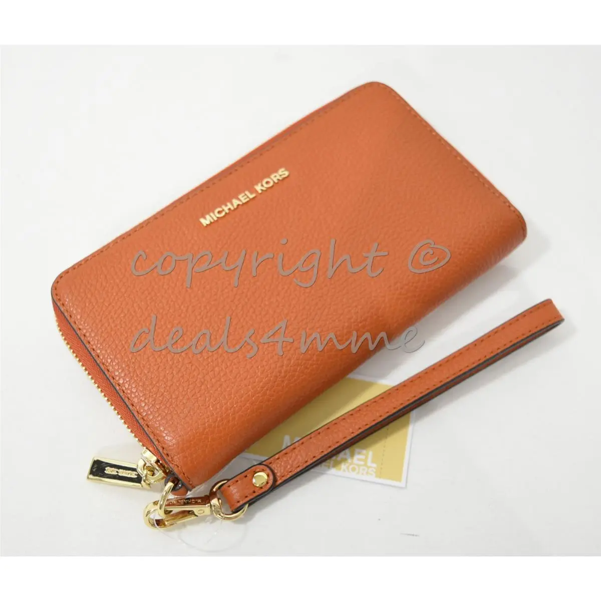 Michael Kors Mercer Large Leather Smartphone Wristlet /wallet in Orange