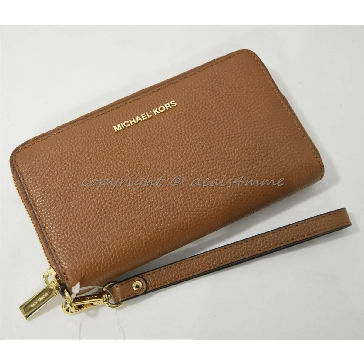 Michael Kors Mercer Large Leather Smartphone Wristlet /wallet in Luggage Brown