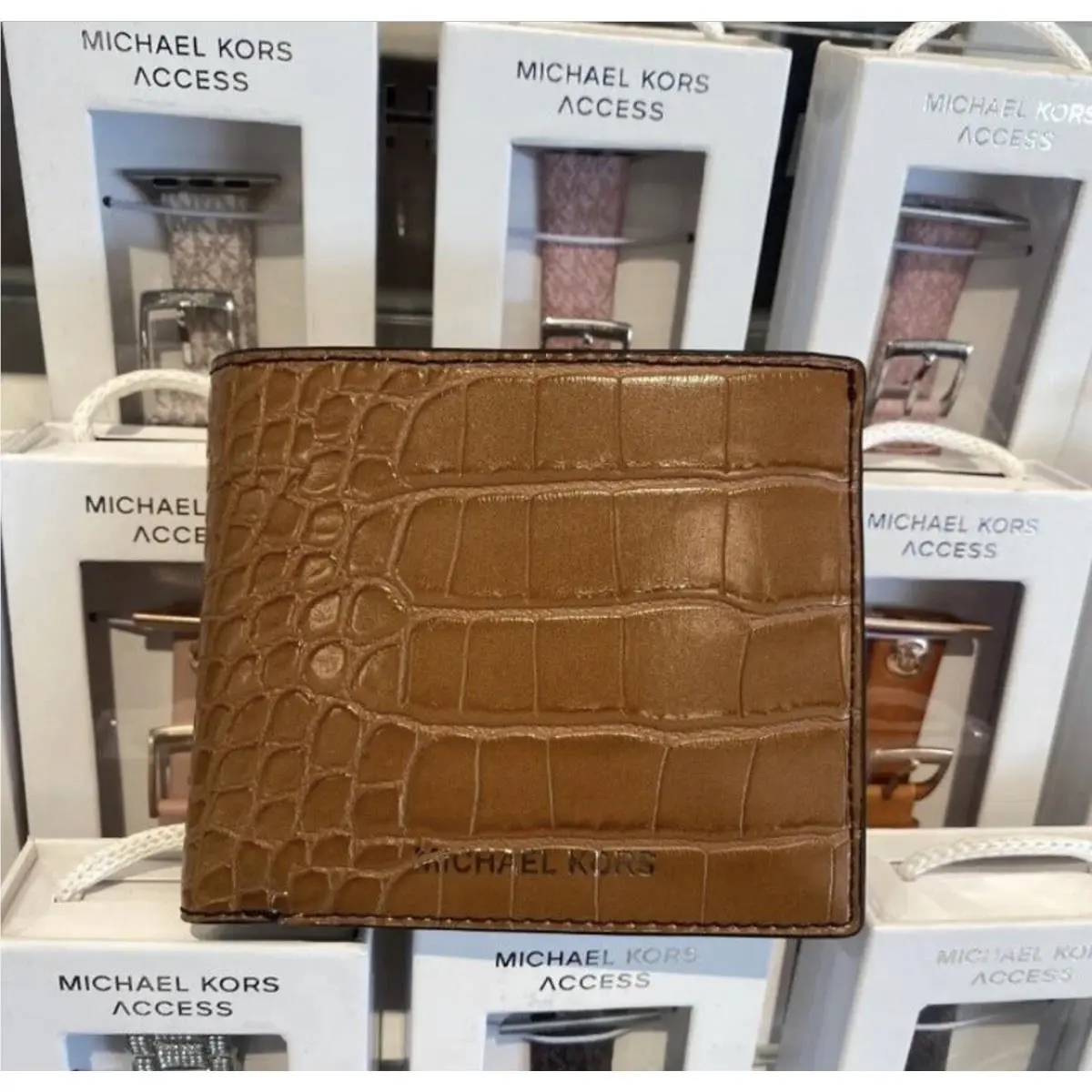 Michael Kors Cooper Embossed Billfold Wallet In Luggage Brown