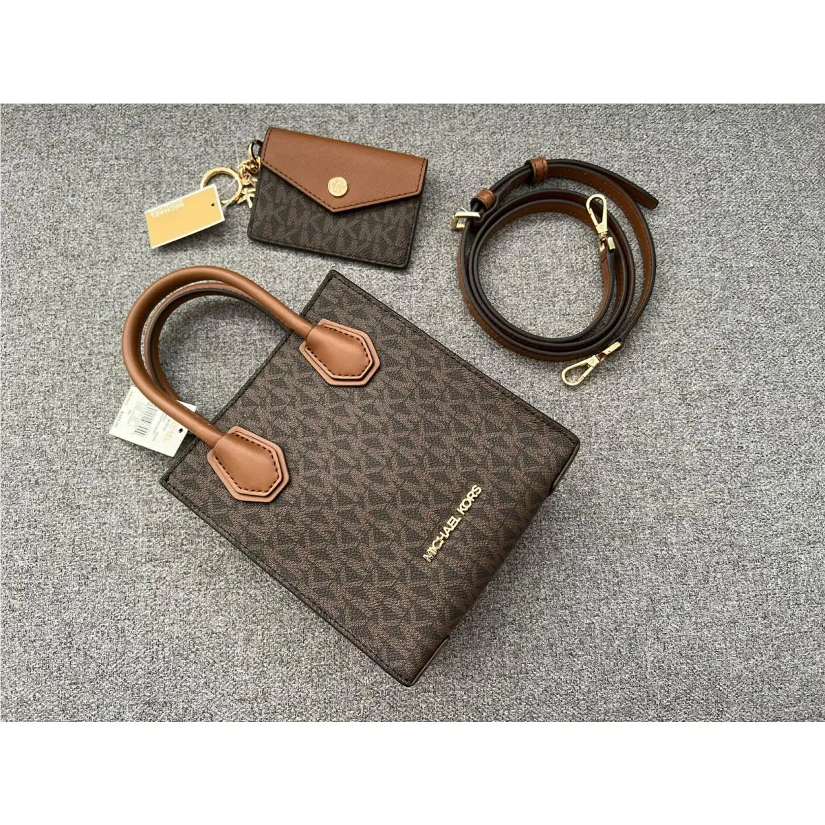 Michael Kors Mercer XS Phone Crossbody + Case Charm In Brown Signature