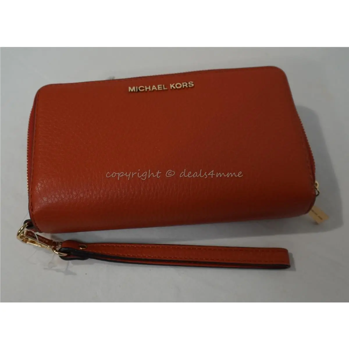 Michael Kors Adele Large Flat Phone Leather Wallet/wristlet in Orange