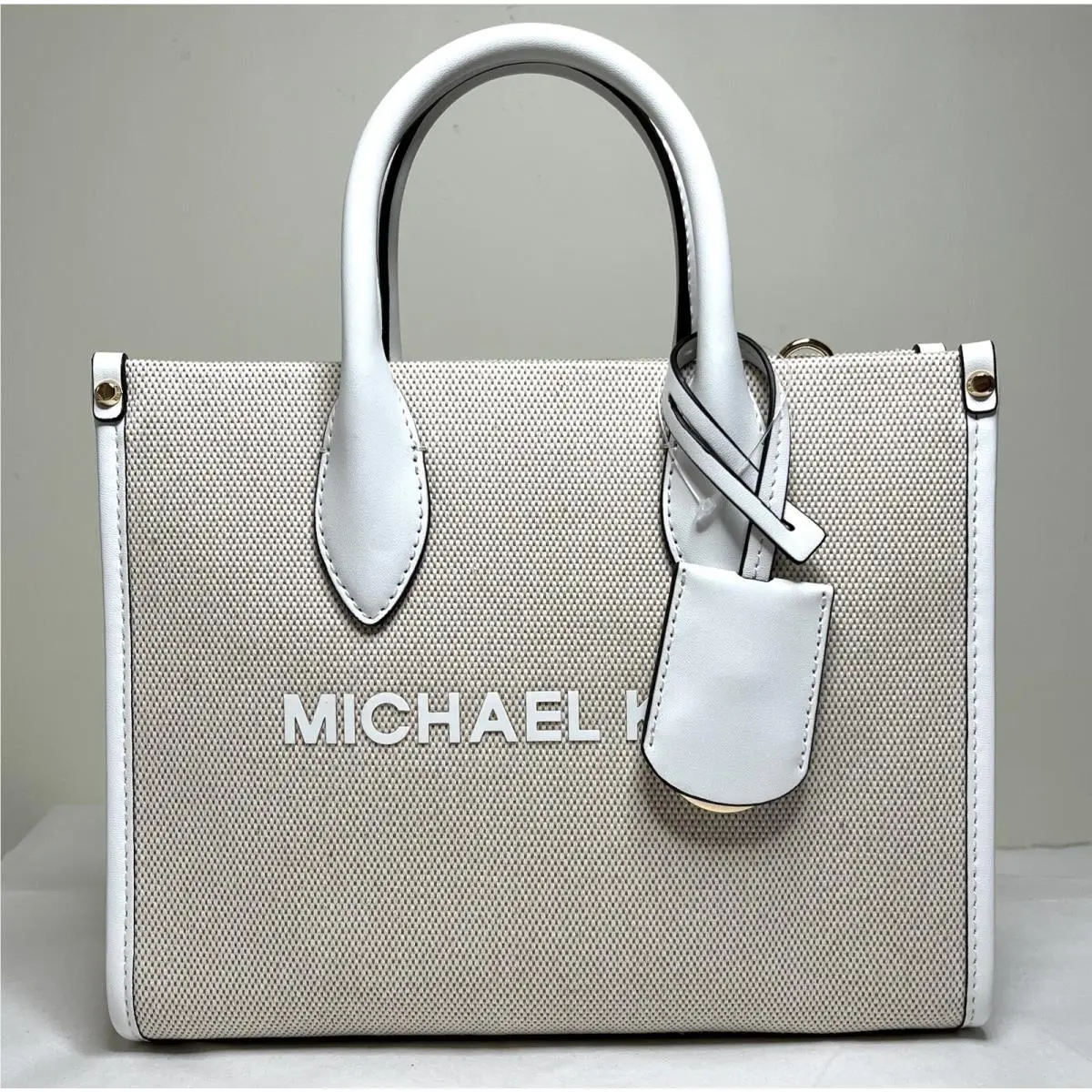 Michael Kors Mirella Small White Multi Canvas Shopper TZ Crossbody Satchel Bag