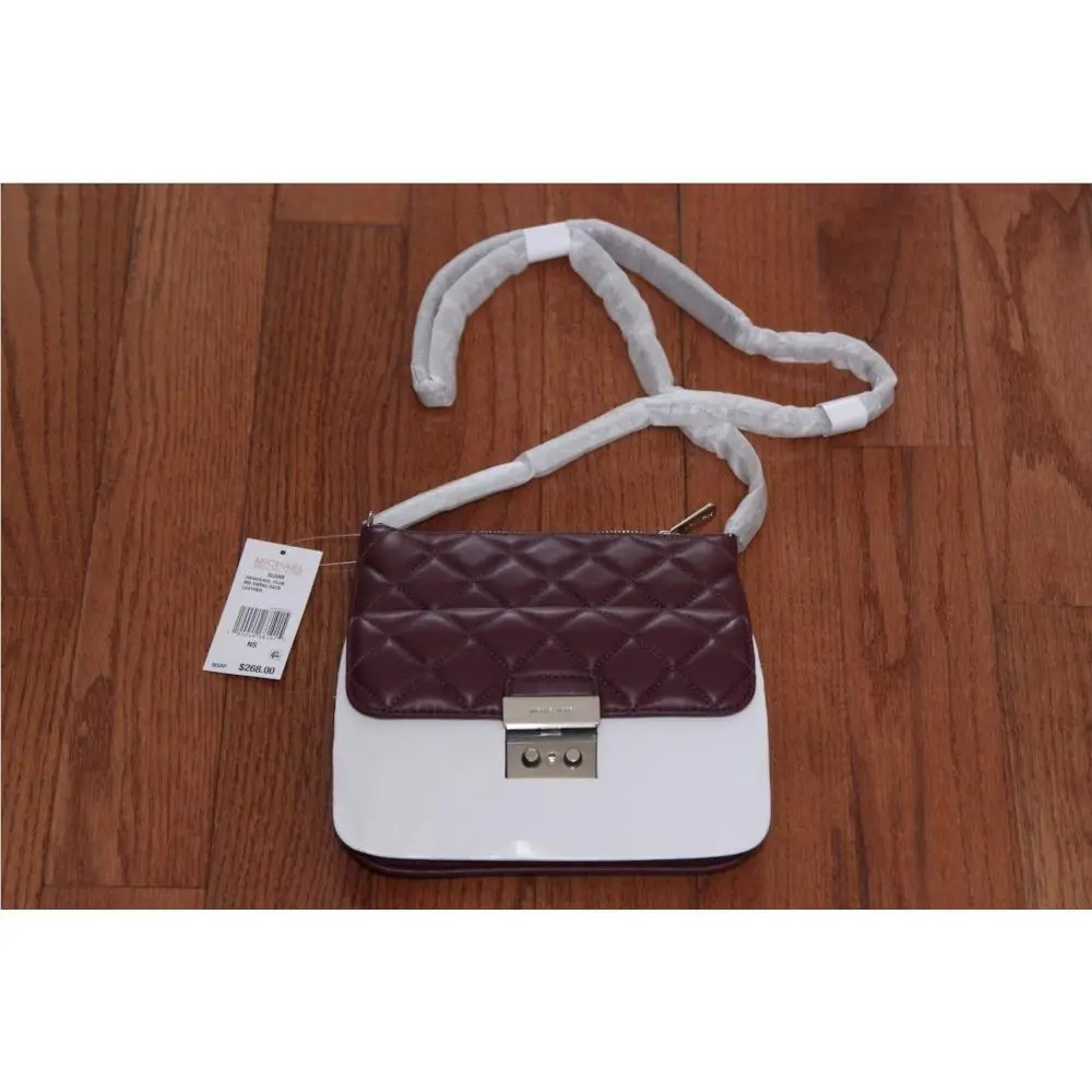 Michael Kors Sloan Medium Swing Pack Messenger Cross Body Purse Plum