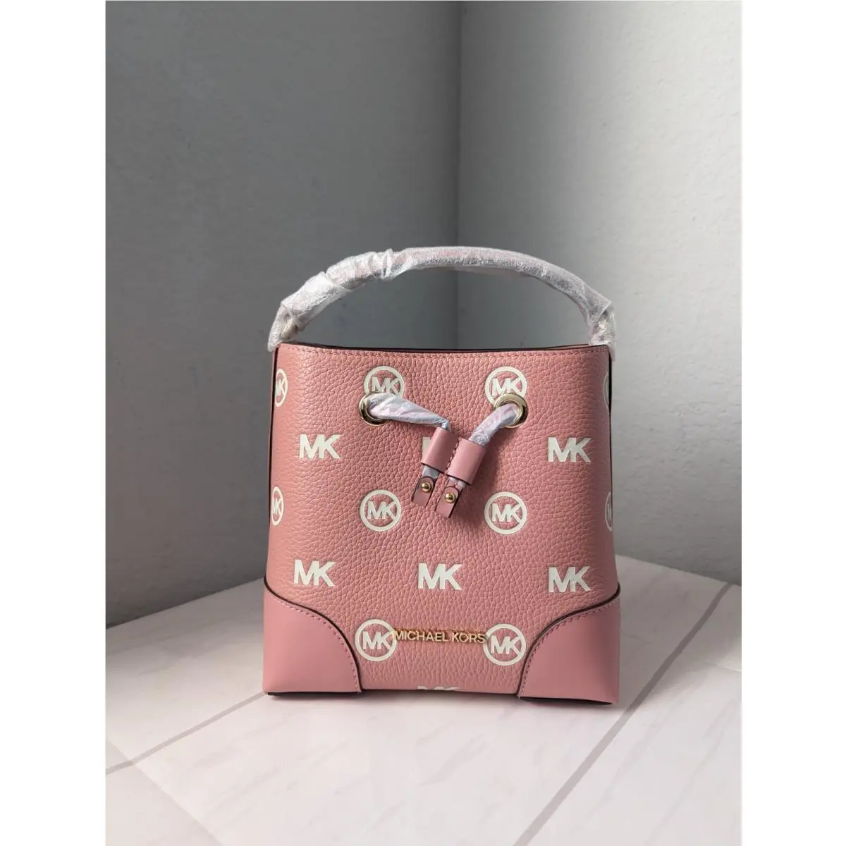 Michael Kors Mercer Small Primrose Embossed Drawstring Bucket Messenger Bag