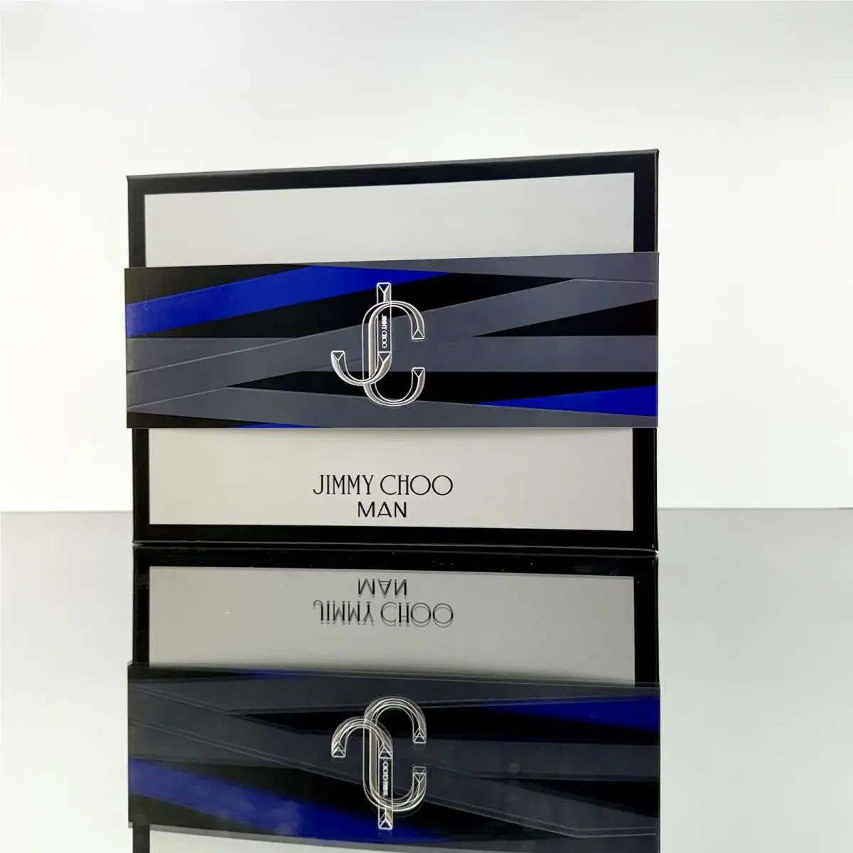 Jimmy Choo Man 3pc Man Gift Set 3.3oz S/g +0.25oz Edt Spr +3.3oz Edt Spr