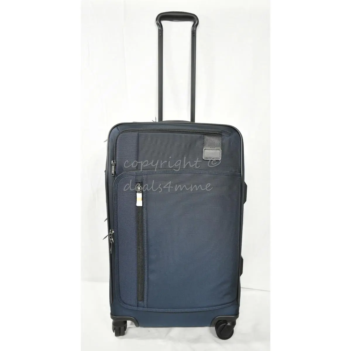 Tumi Merge International Expandable Carry on or Tumi Merge Short Trip Expandable