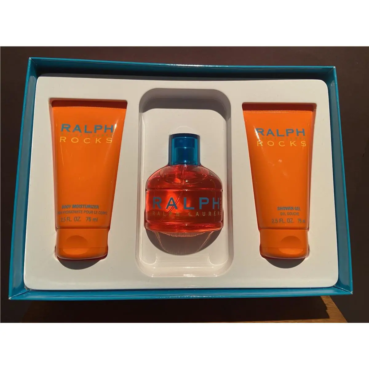 Ralph Rocks By Ralph Lauren 3 Pc. Set 3.4 OZ Edt Spray 2.5 OZ B/lotion S/gel