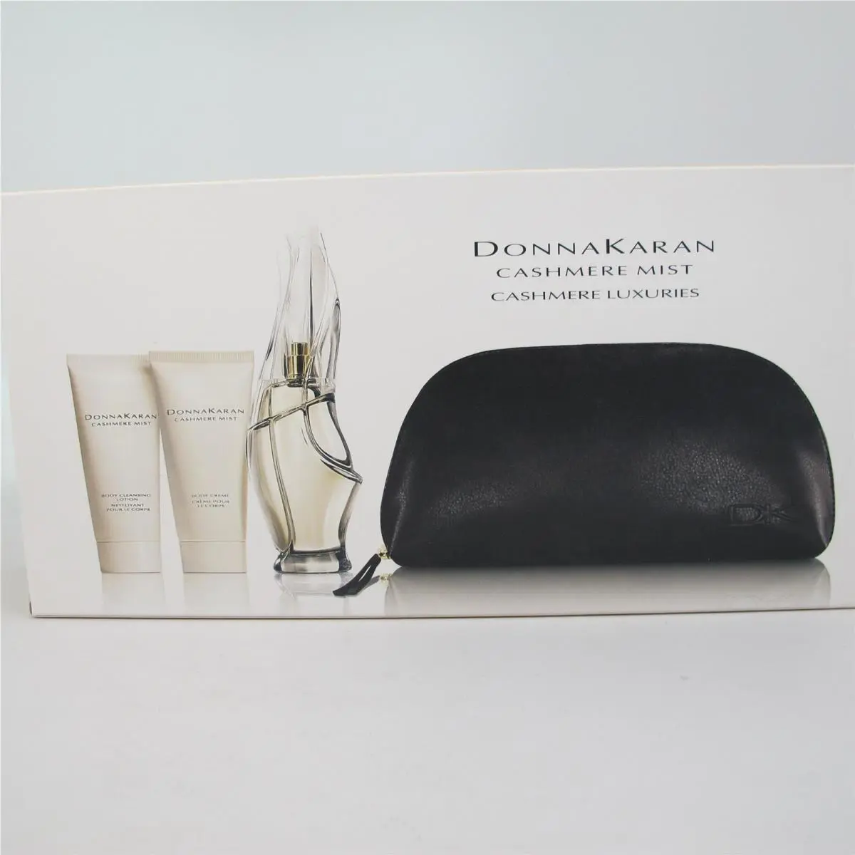 Cashmere Mist by Donna Karan 4 Pcs Set: 3.4 oz Edp Spray Cream Gel Bag