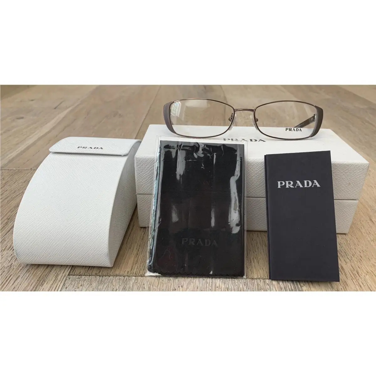VPR58O IAO-1O1 Eyeglasses Rx`able Brown - Made in Italy by Prada