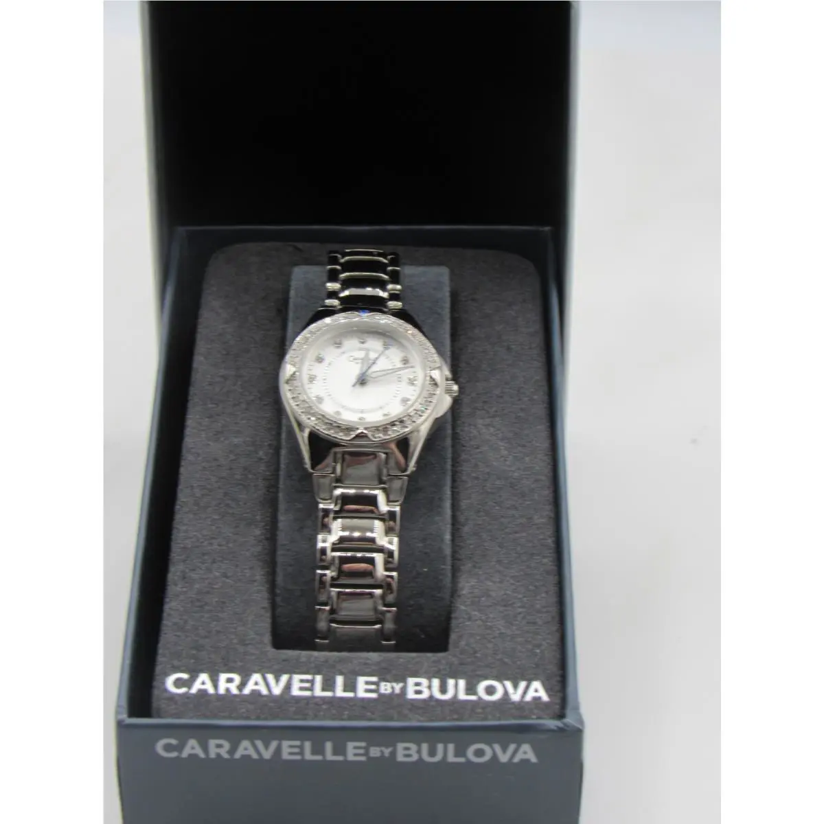 Caravelle BY Bulova 43L121 Women`s Round Analog Clear and Blue Stone Watch