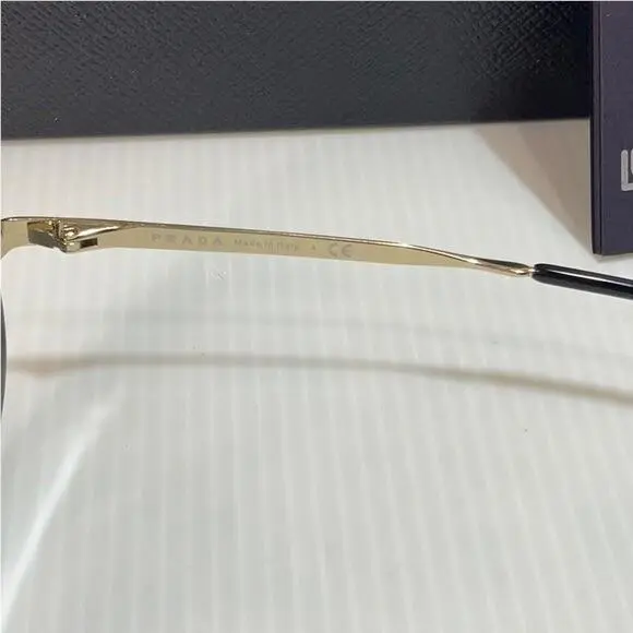 Prada Woman s Sunglasses Spr 52u 18N Round Lenses Gold Frame  display picture 1