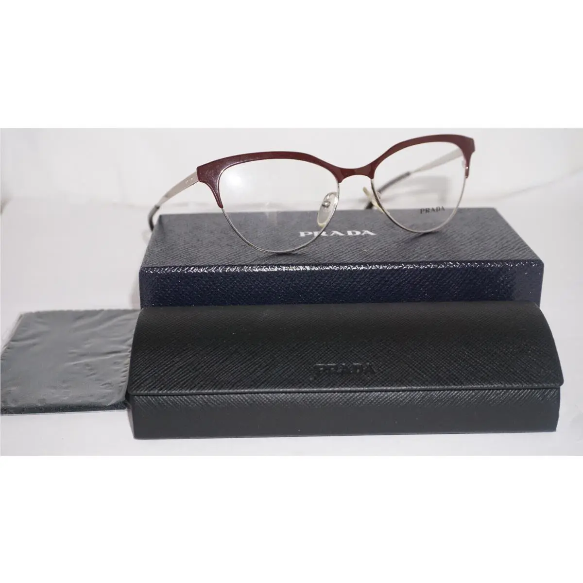 Prada Eyeglasses Burgundy Gold Cateye PR 05UVUF6-1O1 52 16 140