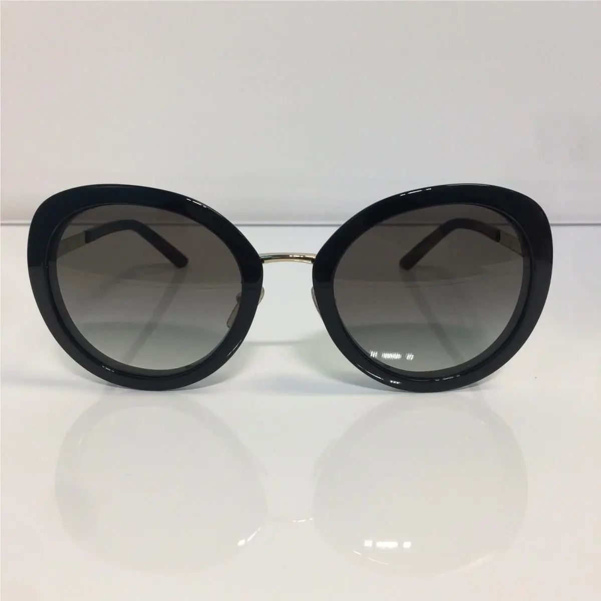 Prada SPR54Y AAV0A7 Black Round Woman Sunglasses