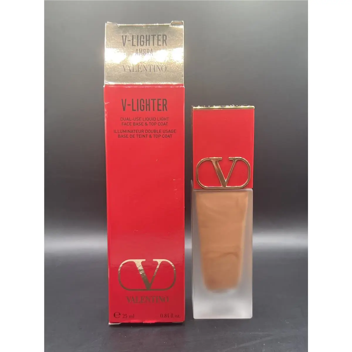 Valentino V-lighter Dual-use Liquid Light Face Base Top Coat 25 ml in Ambra