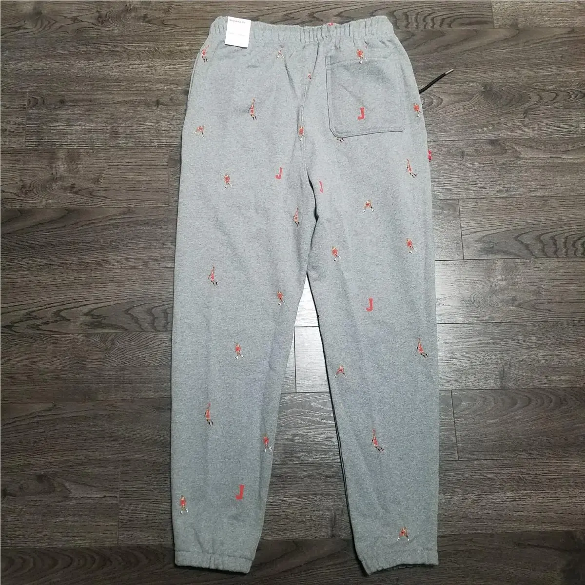 Nike clothing - Air Jordan Essential Statement Fleece Pants - DH3519-063 - Gray (UPC: 195243593027) 1