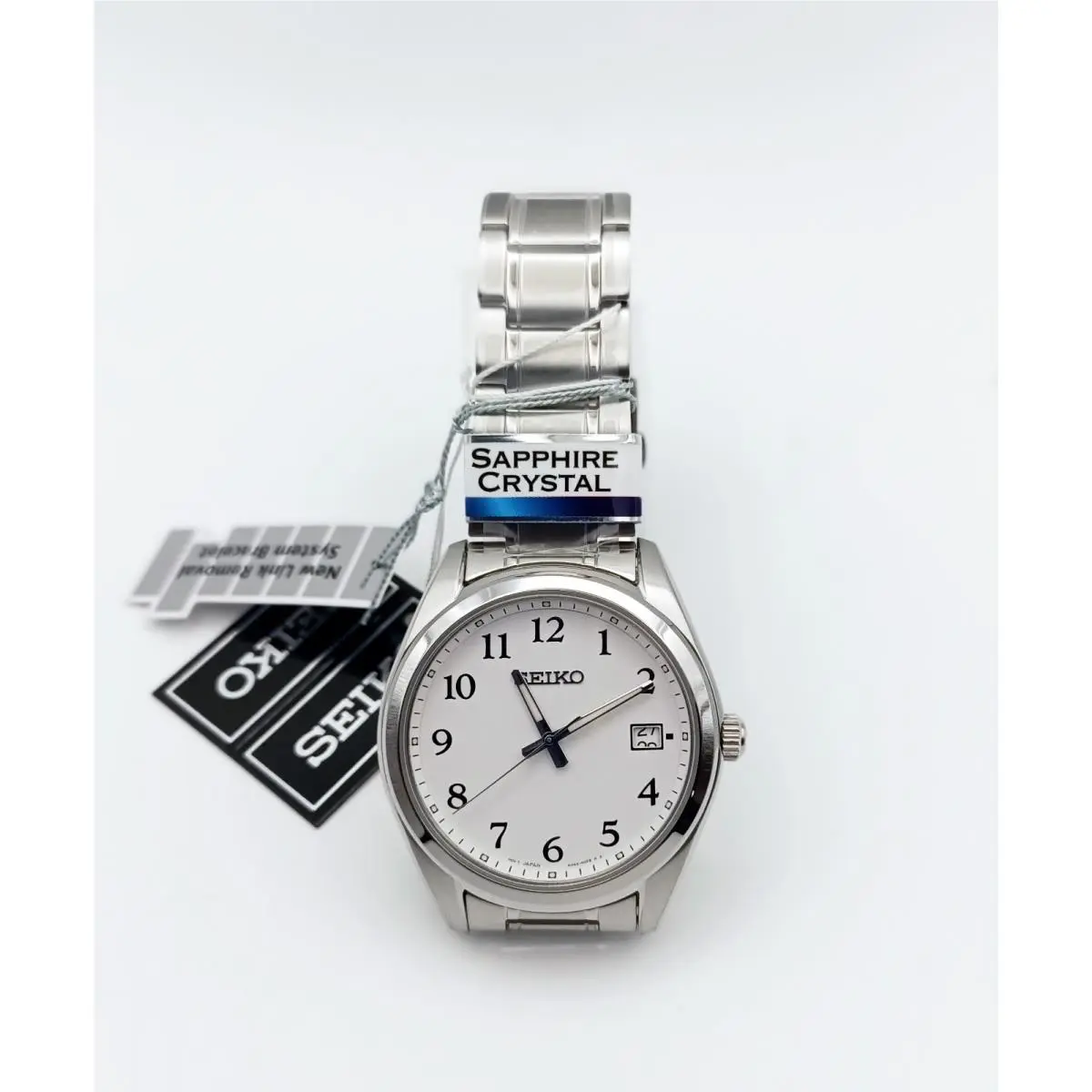 Seiko SUR459P1 Men’s Watch – White Dial Stainless Steel Quartz Classic Design - Dial: White, Band: Silver, Bezel: Silver