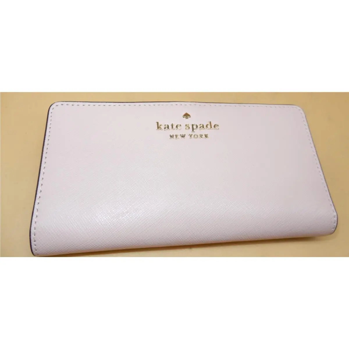 Kate Spade New York Large Slim Bifold Wallet - Chalk Pink New