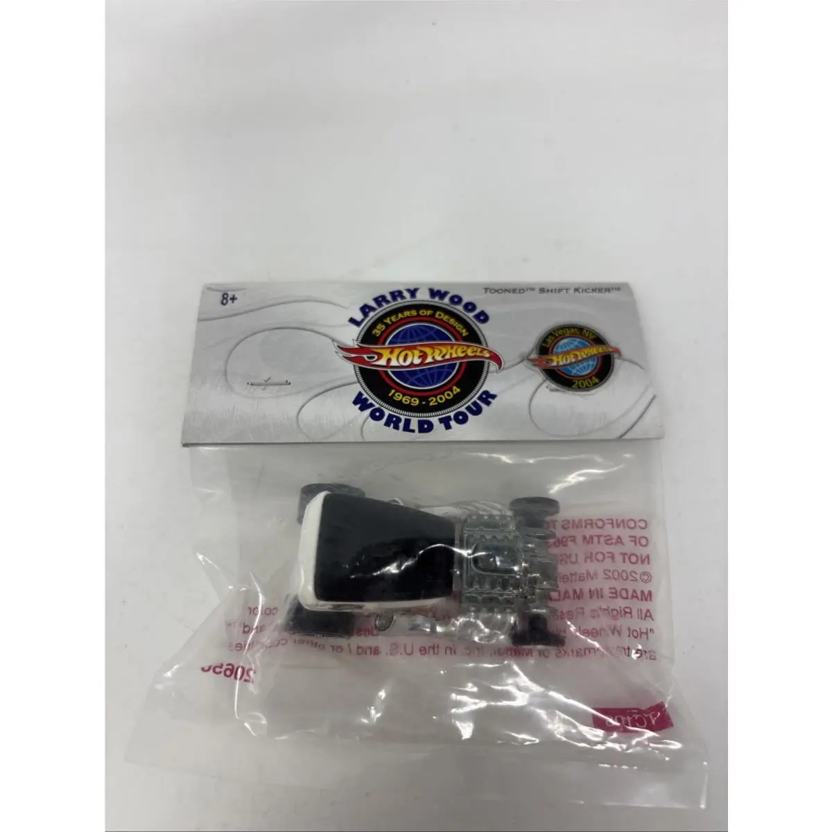 2004 Hot Wheels Larry Wood World Tour Tooned Shift Kicker IN Baggie White