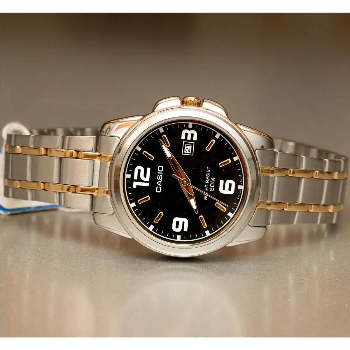 LTP-1314SG-1AV Ladies Analog Watch Stainless Steel Band Gold Silver by Casio