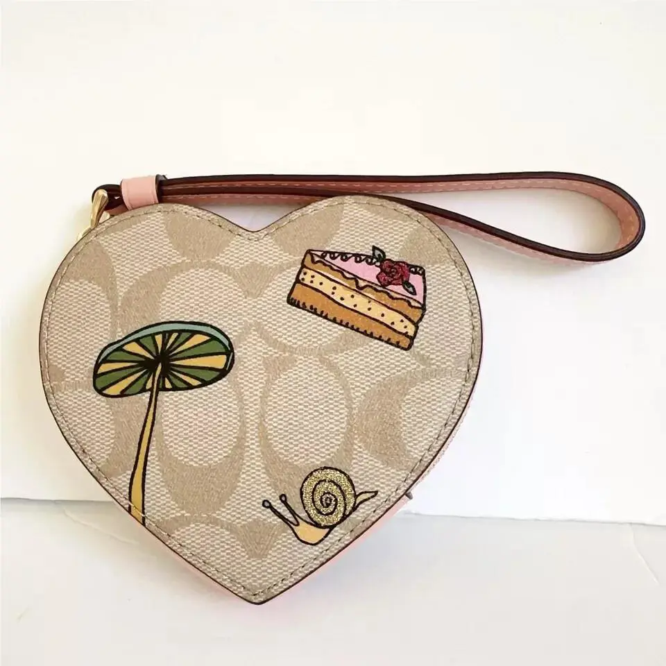 Heart Coin Case In Signature Canvas CP480/CU405/CM317 CU405/observed /light khaki multi by Coach