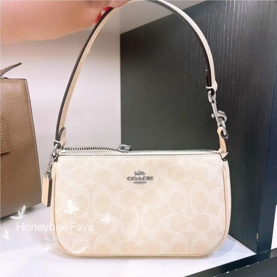 Coach Nolita 19 In Signature Canvas Sliver/hay