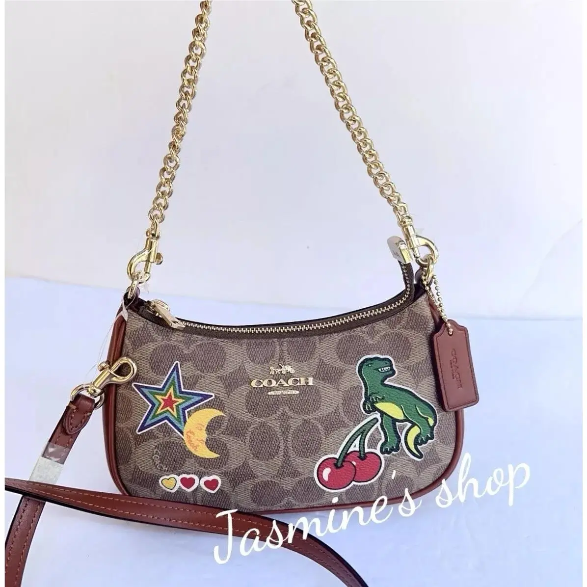 Teri Mini Crossbody Bag in Signature with Bow /lips /sticker Print Opt CW321/sticker print/tan multi by Coach